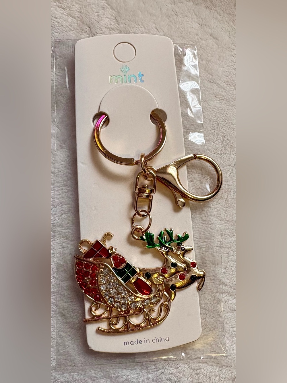 mint Gold-Tone Reindeer & Sleigh Keychain - Red, Green, Black Accents